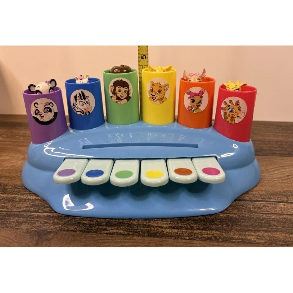 Garanimals Peek A Boo Player Piano Musical Toy Music Keys Pop Up Characters